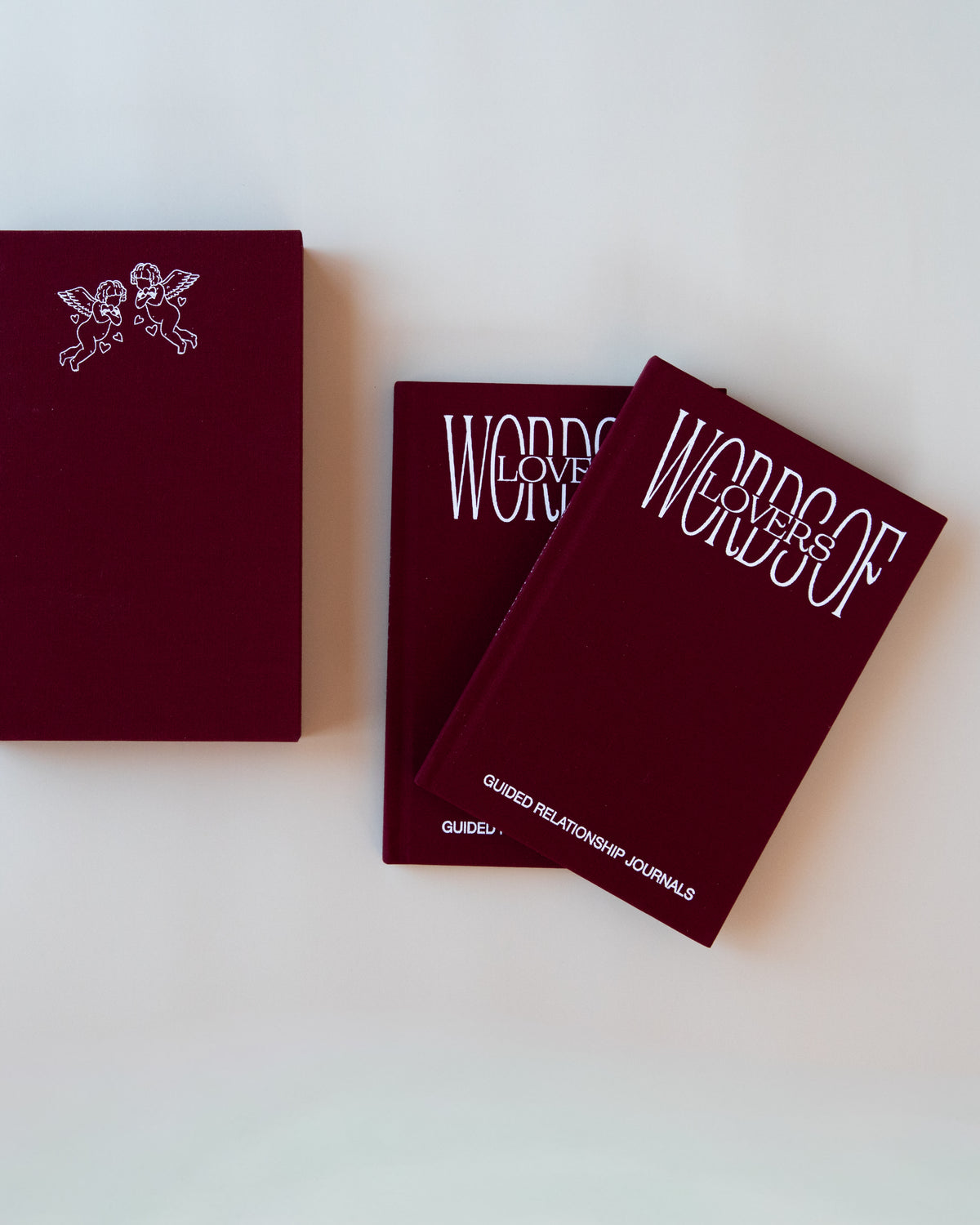 couple journals in red

