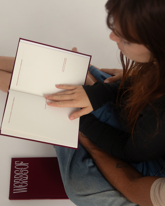 Couple using their relationship journal